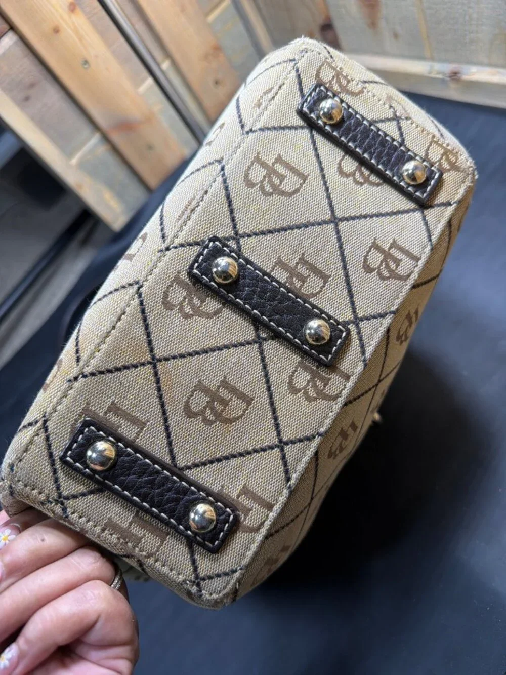 Dooney & Bourke may sells